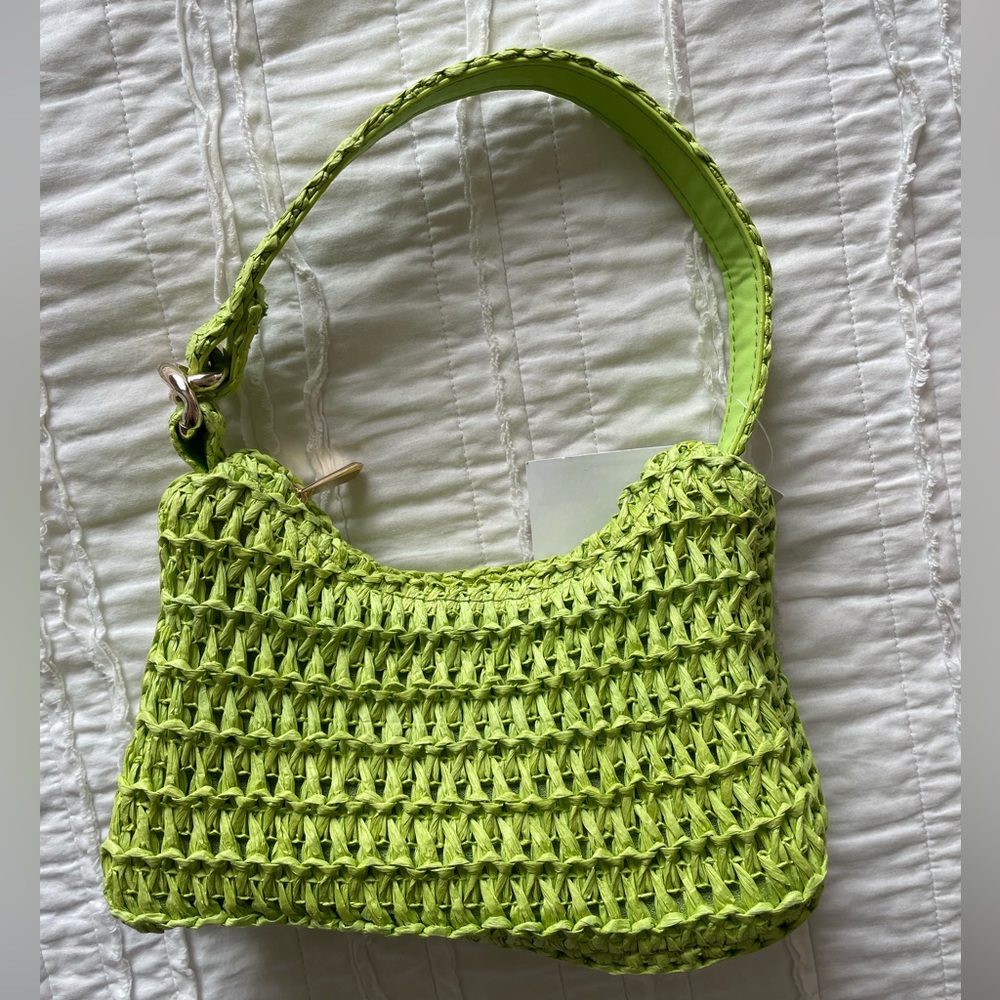 Bright green raffia handbag